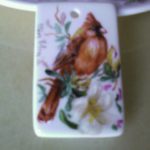 Ciondolo con uccellino cardinale maschio
